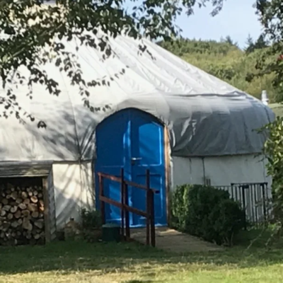 yurt with blue door