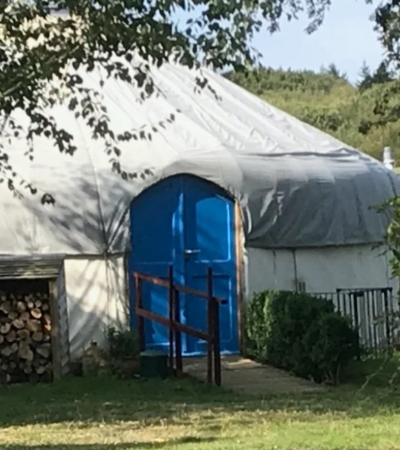 yurt with blue door