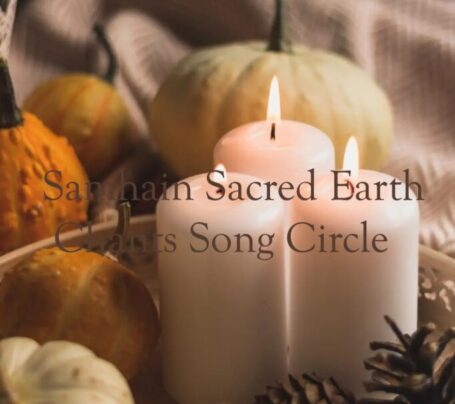 3 candles surrounded by squashes, pumpkins and pinecones with the words Samhain Sacred Earth Chants Song Circle